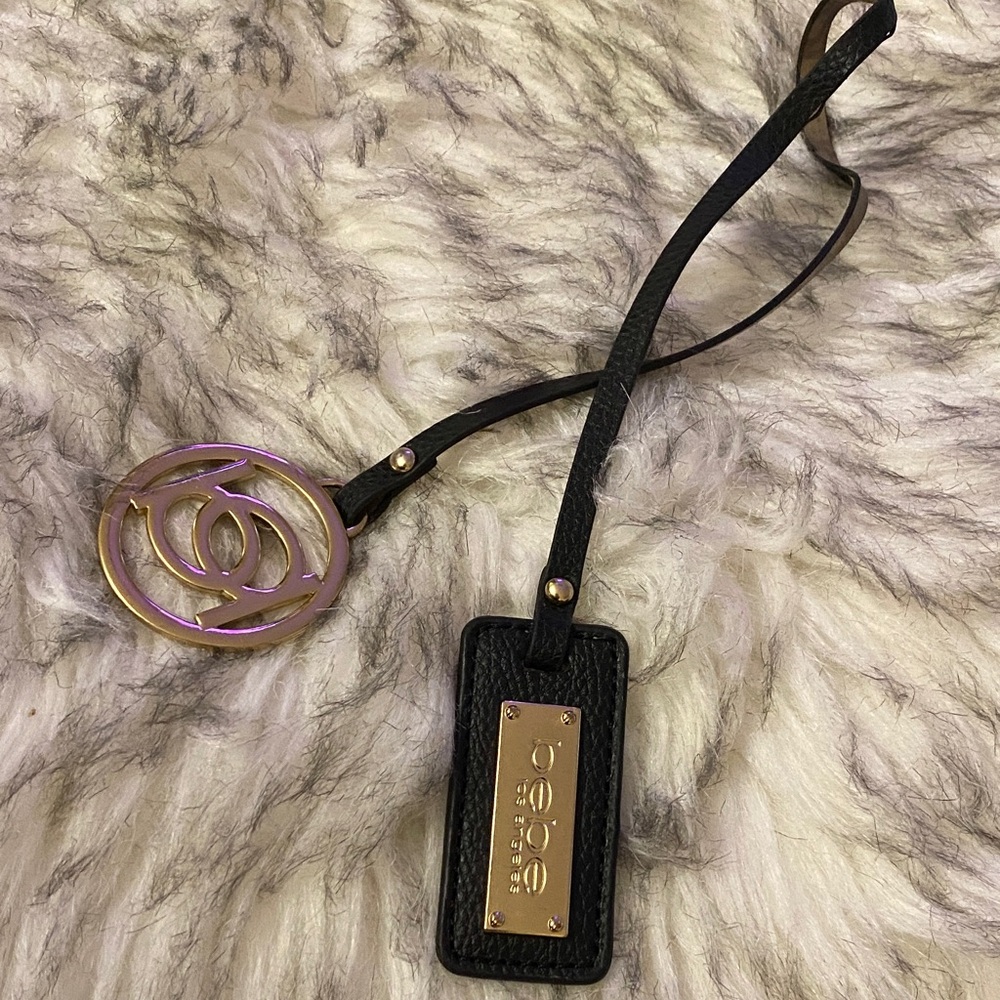 BEBE Black and Gold purse charm